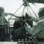 Hank draws samples from water bottles with Bob Stanley and Mindy Hall